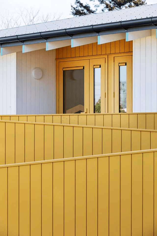 Feature Yellow Cladding Exterior — Garden City Painters Christchurch